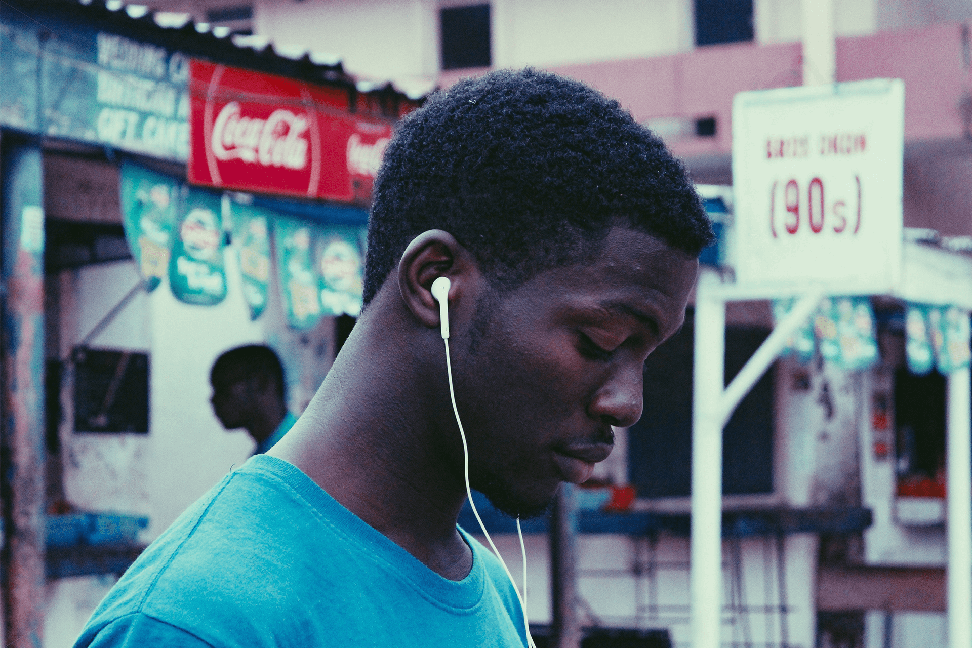 man listening to earphones